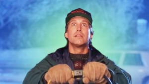 A man bracing himself before switching on his Christmas lights