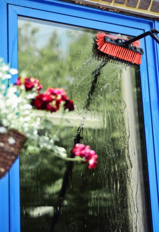 Cleaning Windows With Water Fed Pole